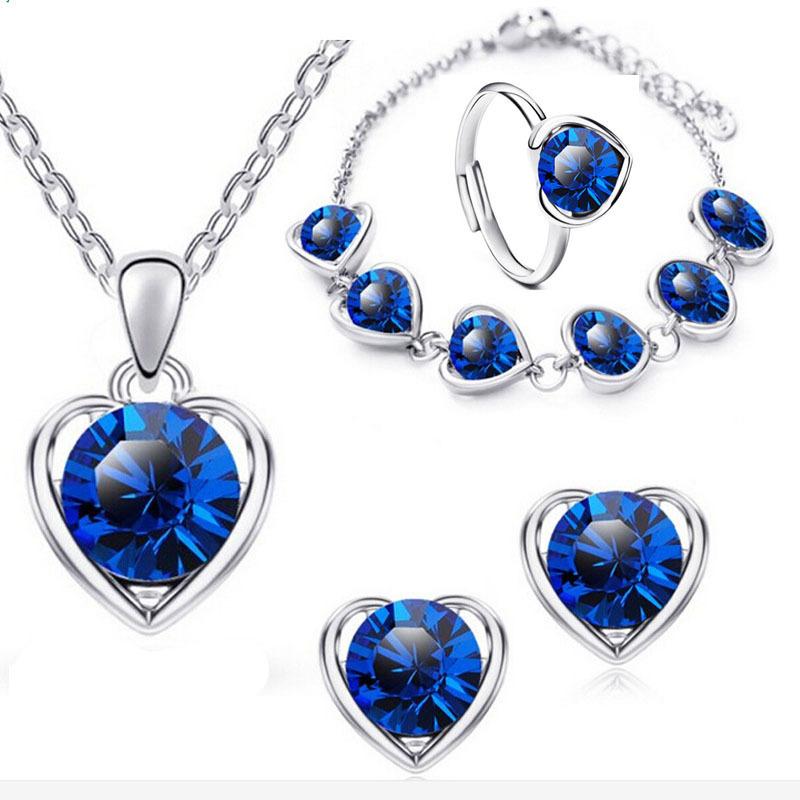 Four-Piece Set of Fashion Crystal Heart-Shaped Necklace, Earrings, Ring and Bracelet