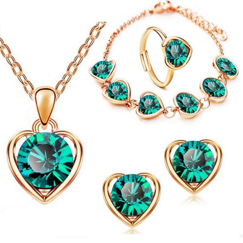 Four-Piece Set of Fashion Crystal Heart-Shaped Necklace, Earrings, Ring and Bracelet